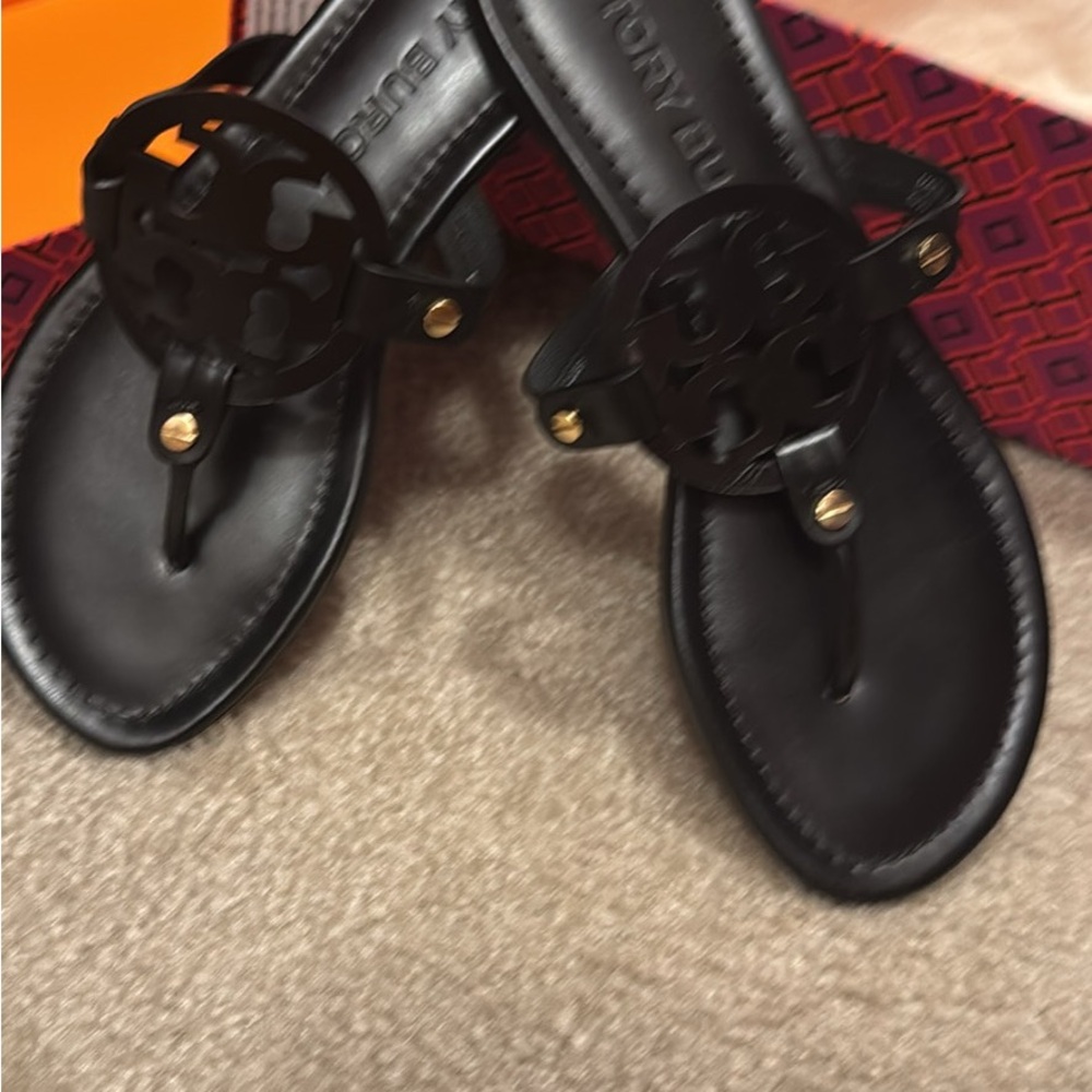 Tory Burch Black Thong Sandals with Gold Details